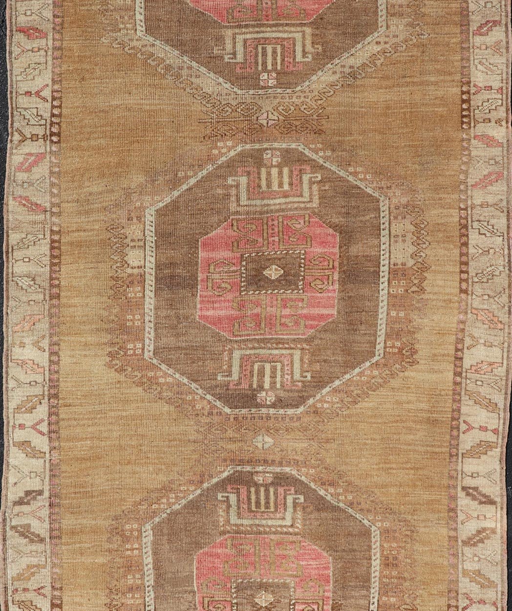 Vintage Turkish Kars wide Gallery Rug With Geometric Medallions by Keivan Woven Arts This Gallery Kars rug showcases three large, octagonal medallions aligned vertically along the length of the Turkish Kars runner. This wide gallery runner is ... - Keivan Woven ArtsEN - 15537 - 26544Rug