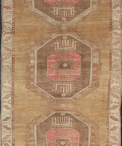 Vintage Turkish Kars wide Gallery Rug With Geometric Medallions by Keivan Woven Arts This Gallery Kars rug showcases three large, octagonal medallions aligned vertically along the length of the Turkish Kars runner. This wide gallery runner is ... - Keivan Woven ArtsEN - 15537 - 26544Rug