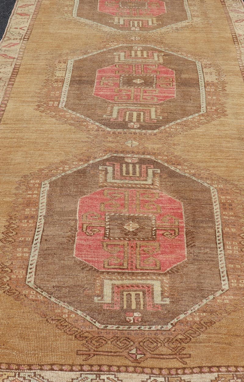 Vintage Turkish Kars wide Gallery Rug With Geometric Medallions by Keivan Woven Arts This Gallery Kars rug showcases three large, octagonal medallions aligned vertically along the length of the Turkish Kars runner. This wide gallery runner is ... - Keivan Woven ArtsEN - 15537 - 26544Rug