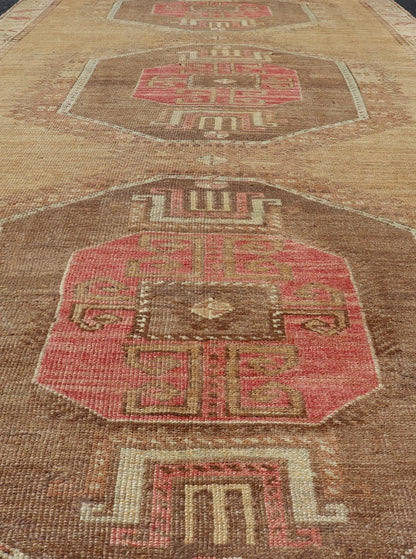 Vintage Turkish Kars wide Gallery Rug With Geometric Medallions by Keivan Woven Arts This Gallery Kars rug showcases three large, octagonal medallions aligned vertically along the length of the Turkish Kars runner. This wide gallery runner is ... - Keivan Woven ArtsEN - 15537 - 26544Rug