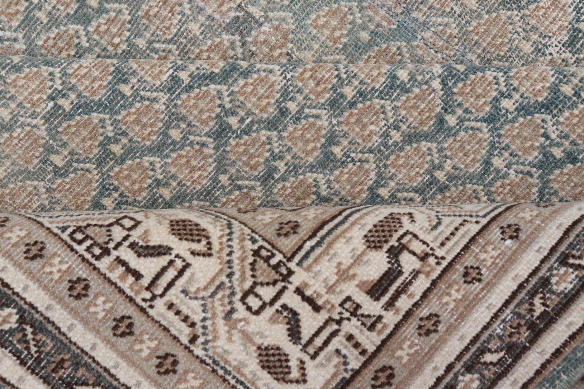 Antique Persian Tabriz Rug in Teal Blue, Salmon & Brown. Keivan Woven Arts / rug EN - 15558, country of origin / type: Persian / Tabriz, circa Early - 20th century. Measures: 6'0 x 9'2 This Tabriz rug features an intricate and detailed border... - Keivan Woven ArtsEN - 15558 - 24766