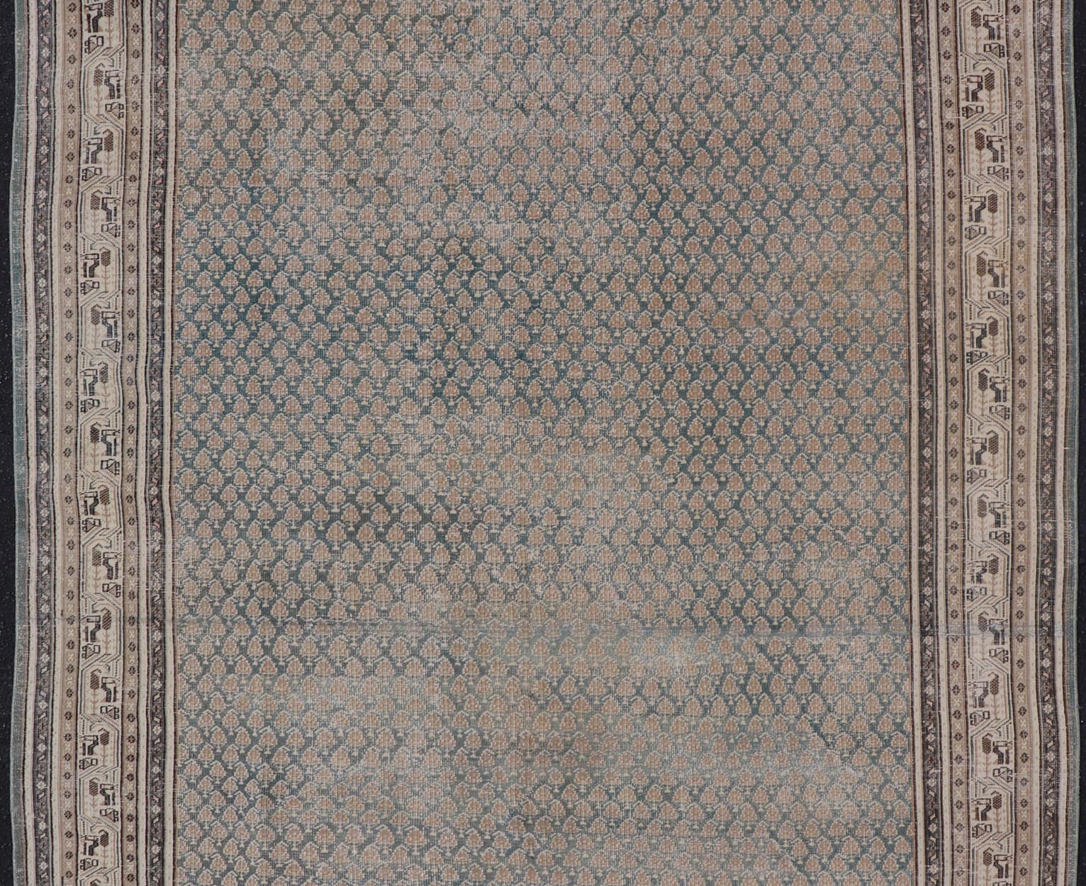 Antique Persian Tabriz Rug in Teal Blue, Salmon & Brown. Keivan Woven Arts / rug EN - 15558, country of origin / type: Persian / Tabriz, circa Early - 20th century. Measures: 6'0 x 9'2 This Tabriz rug features an intricate and detailed border... - Keivan Woven ArtsEN - 15558 - 24766