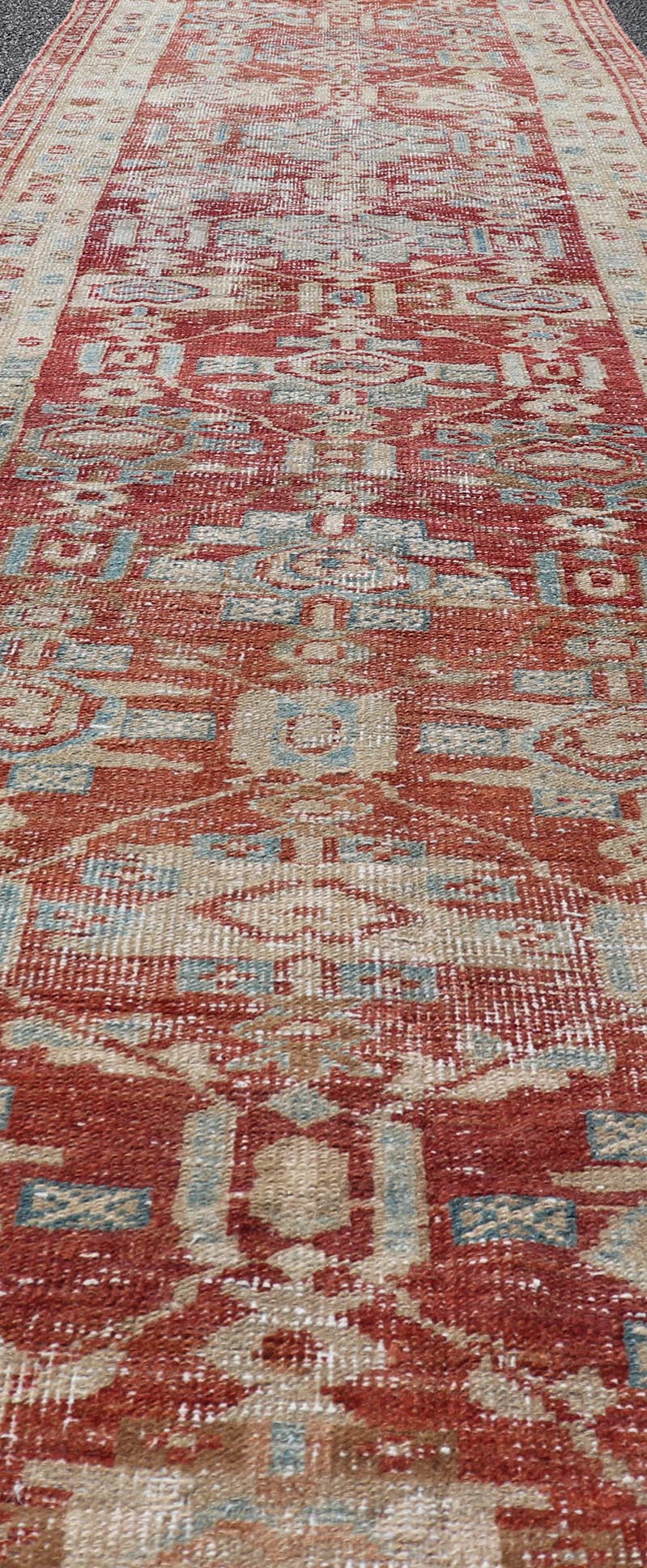 Long Persian Heriz in Geometric Design by Keivan Woven Arts Measures: 2'9 x 14'10 Persian Heriz rugs originate from the Heriz region in Northwestern Iran. This exquisite Heriz runner is a stunning example of Persian craftsmanship. This... - Keivan Woven ArtsEN - 15798 - 26682