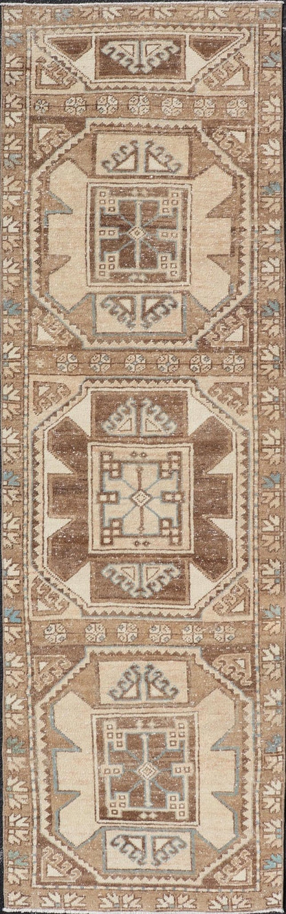 Vintage Runner with large octagonal medallions by Keivan Woven Arts Measures: 2'11" x 10' This exquisite vintage Turkish runner features a trio of large, octagonal medallions placed along the length of the vintage runner. The medallions a... - Keivan Woven ArtsEN - 15870 - 26904Rug
