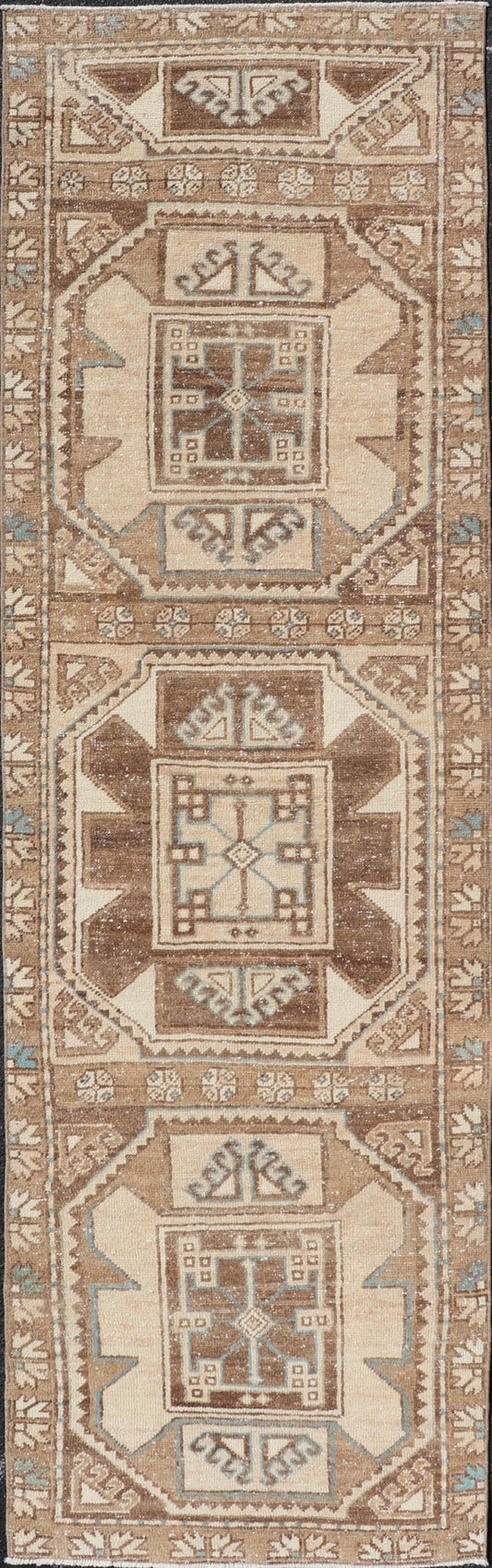 Vintage Runner with large octagonal medallions by Keivan Woven Arts Measures: 2'11" x 10' This exquisite vintage Turkish runner features a trio of large, octagonal medallions placed along the length of the vintage runner. The medallions a... - Keivan Woven ArtsEN - 15870 - 26904Rug