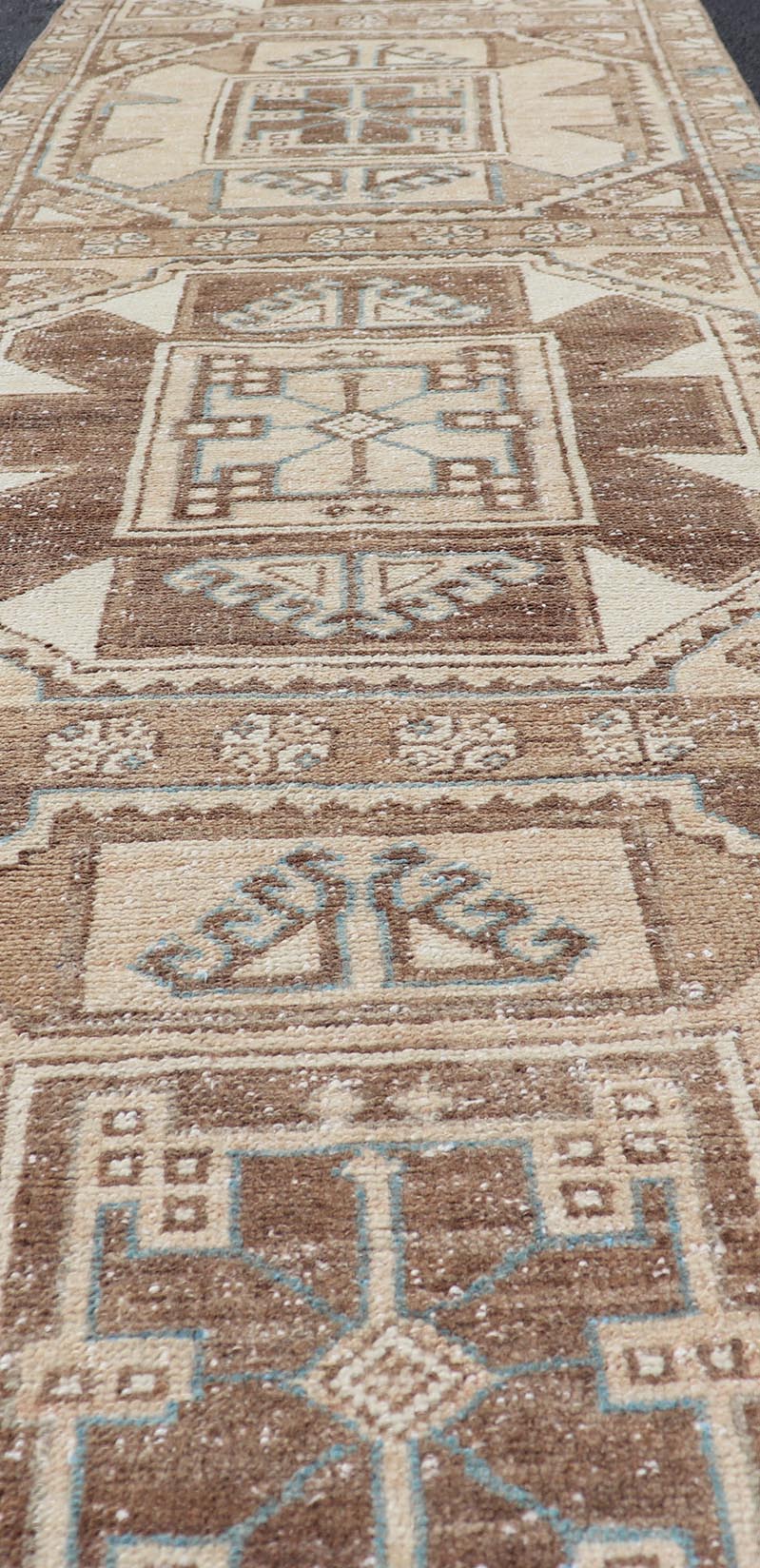 Vintage Runner with large octagonal medallions by Keivan Woven Arts Measures: 2'11" x 10' This exquisite vintage Turkish runner features a trio of large, octagonal medallions placed along the length of the vintage runner. The medallions a... - Keivan Woven ArtsEN - 15870 - 26904Rug