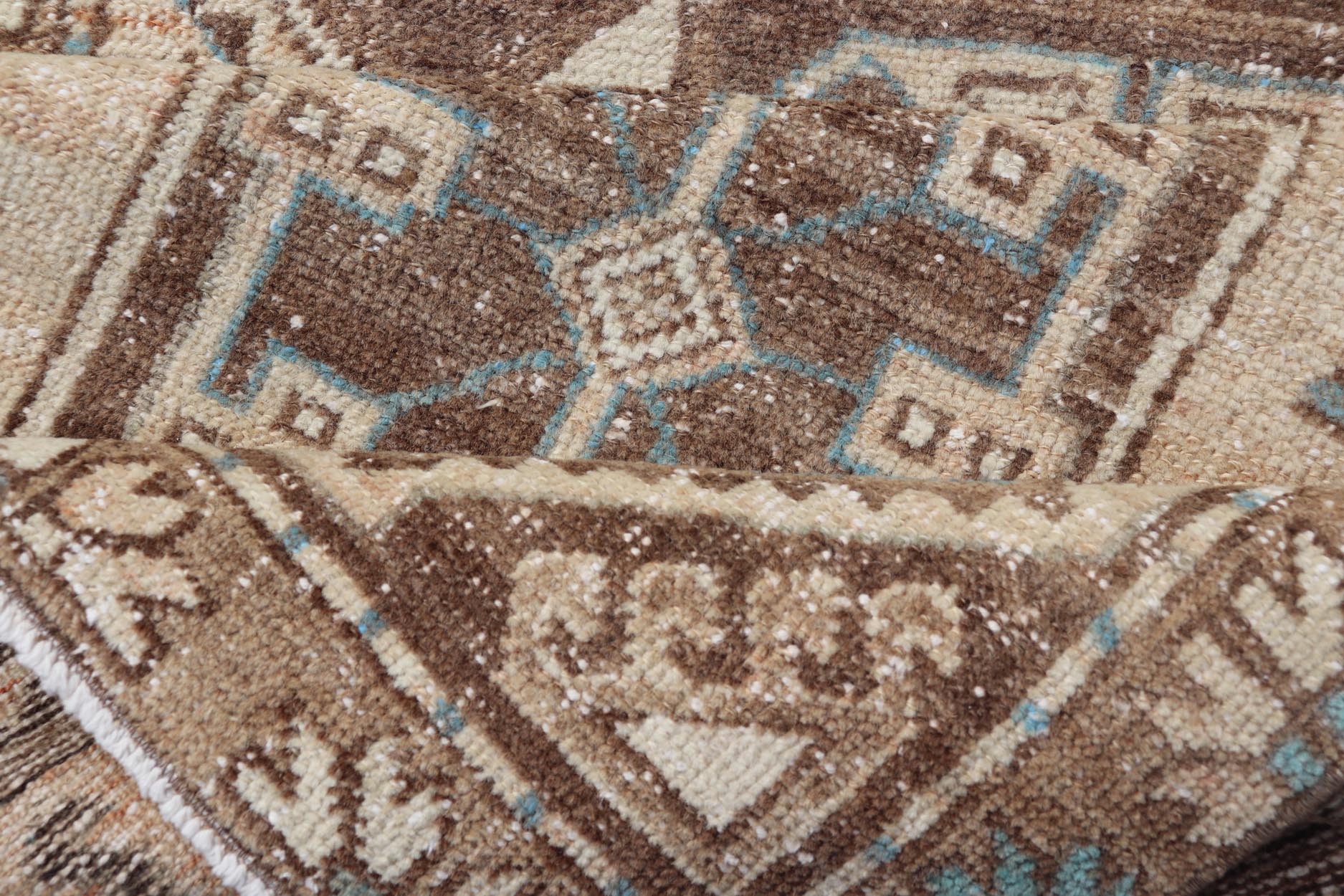 Vintage Runner with large octagonal medallions by Keivan Woven Arts Measures: 2'11" x 10' This exquisite vintage Turkish runner features a trio of large, octagonal medallions placed along the length of the vintage runner. The medallions a... - Keivan Woven ArtsEN - 15870 - 26904Rug