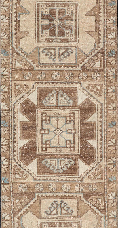Vintage Runner with large octagonal medallions by Keivan Woven Arts Measures: 2'11" x 10' This exquisite vintage Turkish runner features a trio of large, octagonal medallions placed along the length of the vintage runner. The medallions a... - Keivan Woven ArtsEN - 15870 - 26904Rug