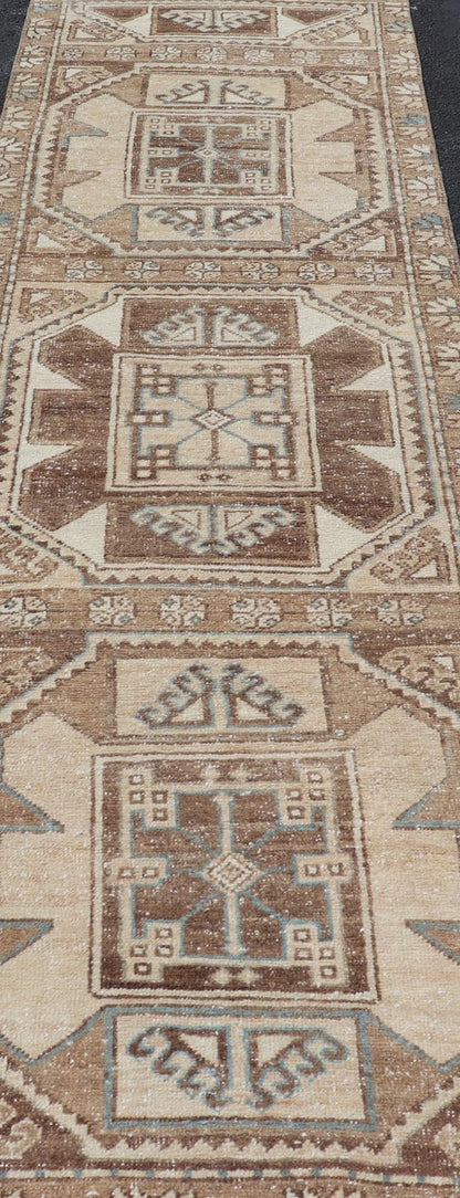 Vintage Runner with large octagonal medallions by Keivan Woven Arts Measures: 2'11" x 10' This exquisite vintage Turkish runner features a trio of large, octagonal medallions placed along the length of the vintage runner. The medallions a... - Keivan Woven ArtsEN - 15870 - 26904Rug