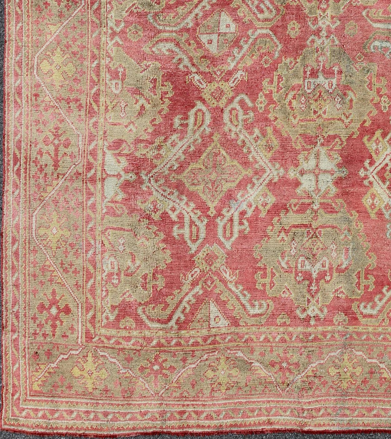 Rose red, light green and pinkish red antique Turkish Oushak rug with flowing design. Keivan Woven Arts / rug EN - 165065, country of origin type: Turkey Oushak, circa 1920. Measures: 11' x 13'7. This Oushak carpet (circa early 20th century) featur... - Keivan Woven ArtsEN - 165065 - 9420Rug