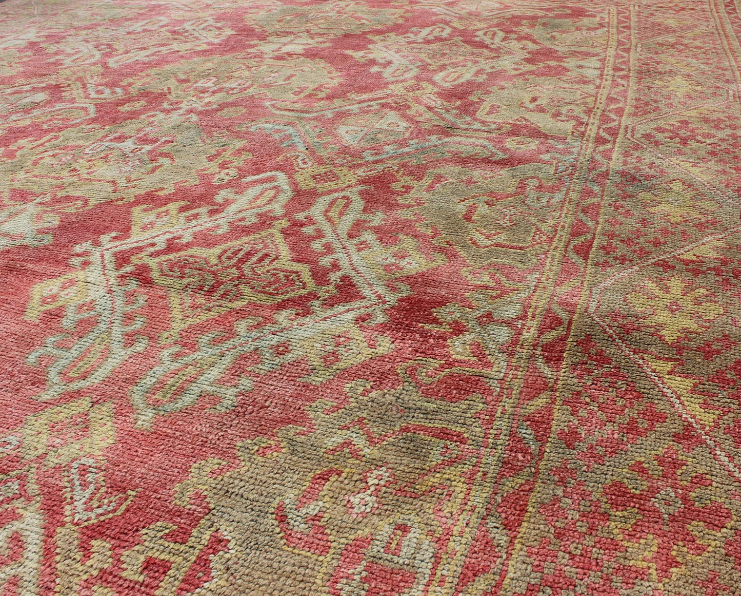 Rose red, light green and pinkish red antique Turkish Oushak rug with flowing design. Keivan Woven Arts / rug EN - 165065, country of origin type: Turkey Oushak, circa 1920. Measures: 11' x 13'7. This Oushak carpet (circa early 20th century) featur... - Keivan Woven ArtsEN - 165065 - 9420Rug