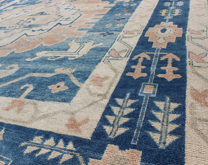 Blue and Salmon Vintage Turkish Oushak Rug with Layered Medallion and Motifs. Keivan Woven Arts / rug / EN - 165189, country of origin / type: Turkey / Oushak, Mid - 20th century. Measures: 9'11 x 11'8. This beautiful vintage rug from mid - 20th centu... - Keivan Woven ArtsEN - 165189 - 9016Rug