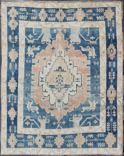 Blue and Salmon Vintage Turkish Oushak Rug with Layered Medallion and Motifs. Keivan Woven Arts / rug / EN - 165189, country of origin / type: Turkey / Oushak, Mid - 20th century. Measures: 9'11 x 11'8. This beautiful vintage rug from mid - 20th centu... - Keivan Woven ArtsEN - 165189 - 9016Rug