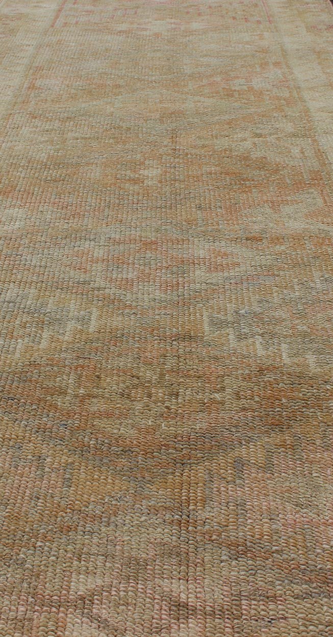 Vintage Turkish Oushak Runner with Geometric Medallion Design in Muted Orange Vintage Oushak runner from Turkey with medallion geometric design in subdued tones, Keivan Woven Arts / rug en - 165288, country of origin / type: Turkey / Oushak, circ... - Keivan Woven ArtsEN - 165288 - 11181Rug