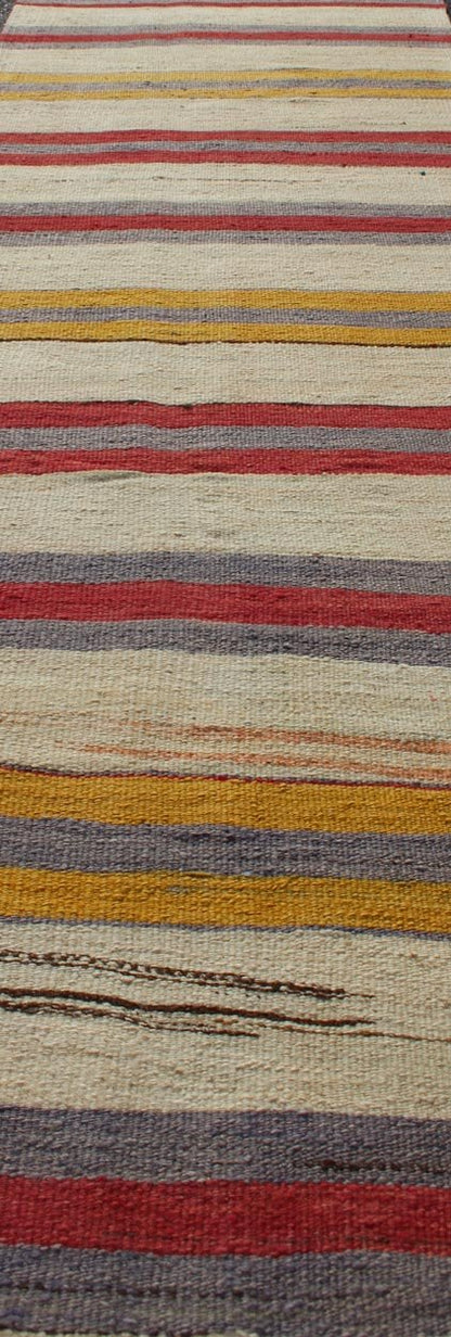 Yellow, red, ivory, and gray stripe design flat - weave vintage runner from Turkey, rug en - 165311, country of origin / type: Iran / Kilim, circa 1950. Featuring a dynamic stripe design, this unique 1950s Kilim runner showcases an array of vibrant ... - Keivan Woven ArtsEN - 165311 - 10950Rug
