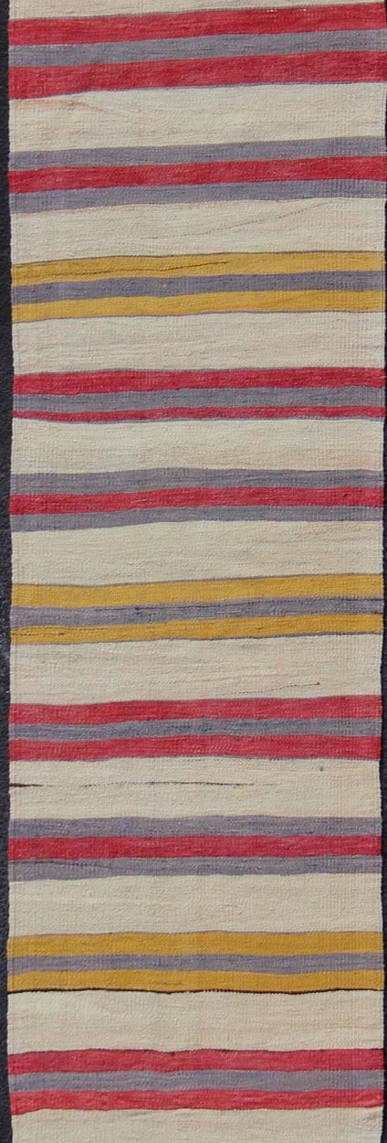 Yellow, red, ivory, and gray stripe design flat - weave vintage runner from Turkey, rug en - 165311, country of origin / type: Iran / Kilim, circa 1950. Featuring a dynamic stripe design, this unique 1950s Kilim runner showcases an array of vibrant ... - Keivan Woven ArtsEN - 165311 - 10950Rug