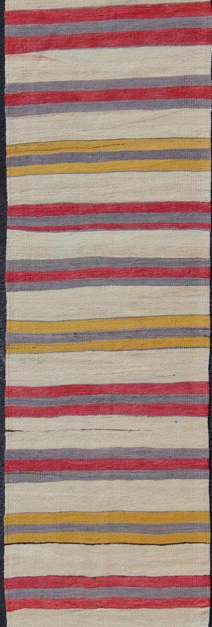 Yellow, red, ivory, and gray stripe design flat - weave vintage runner from Turkey, rug en - 165311, country of origin / type: Iran / Kilim, circa 1950. Featuring a dynamic stripe design, this unique 1950s Kilim runner showcases an array of vibrant ... - Keivan Woven ArtsEN - 165311 - 10950Rug