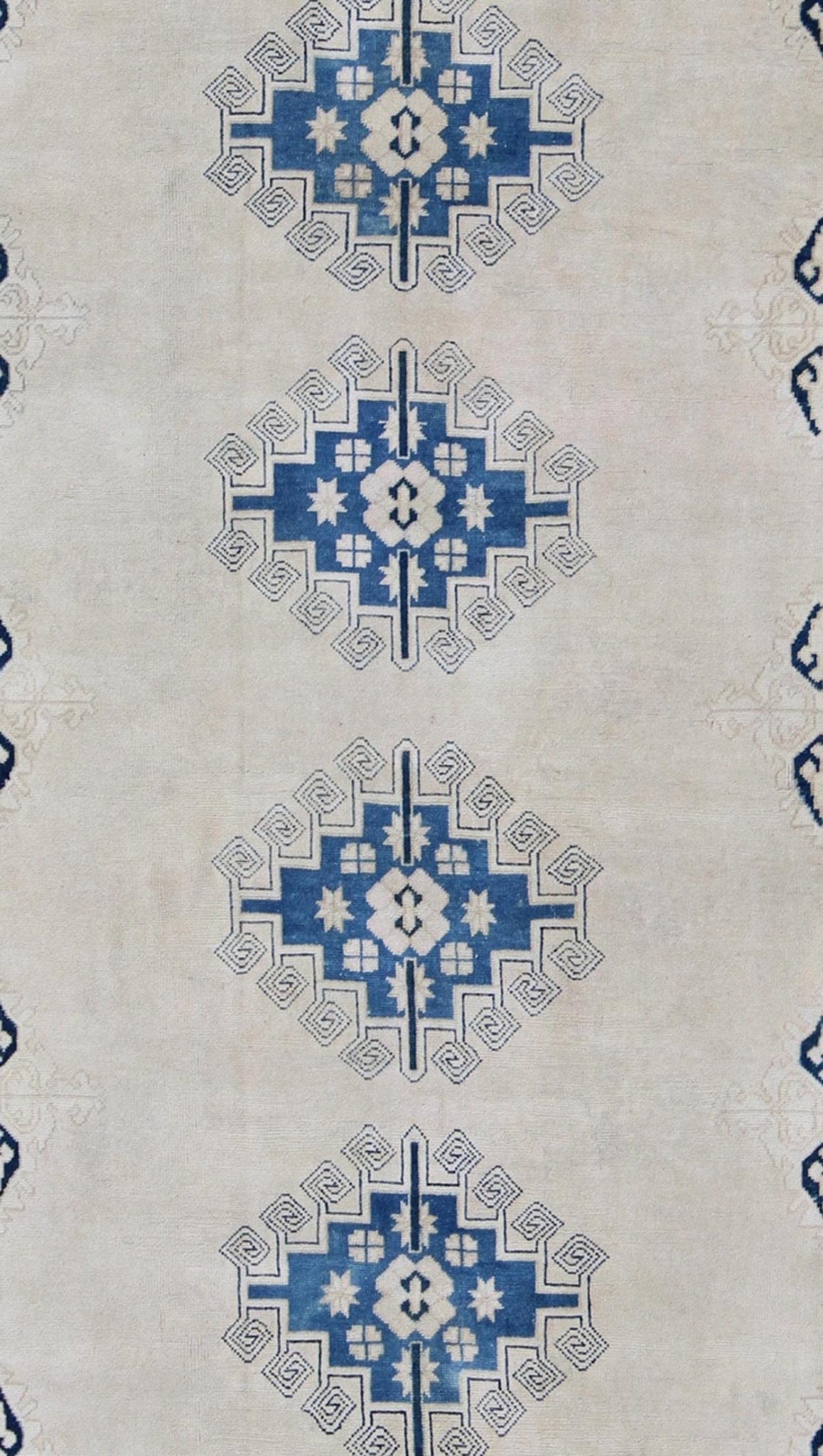 Cream and Blue Geometric Medallion Design Vintage Turkish Oushak Rug kwarugs Turkish vintage Oushak rug with Medallion geometric design in blue and cream, Keivan Woven Arts / rug en - 165347, country of origin / type: Turkey / Oushak, circa 1940 ... - Keivan Woven ArtsEN - 165347 - 9442Rug