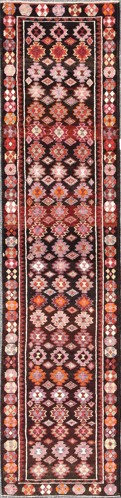 Black and Brown Background Colorful Vintage Turkish Runner with Geometric Design, rug en - 165383, country of origin / type: Turkey / Oushak, circa 1950 This vintage Turkish runner (circa mid - 20th century) features a unique blend of colors and an ... - Keivan Woven ArtsEN - 165383 - 9026Rug