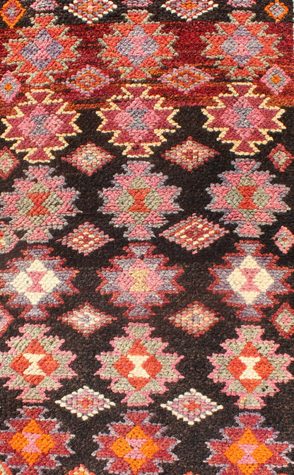 Black and Brown Background Colorful Vintage Turkish Runner with Geometric Design, rug en - 165383, country of origin / type: Turkey / Oushak, circa 1950 This vintage Turkish runner (circa mid - 20th century) features a unique blend of colors and an ... - Keivan Woven ArtsEN - 165383 - 9026Rug