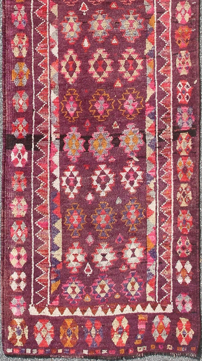 Colorful vintage Turkish Long Oushak runner with geometric design in Purple & Plum background , rug en - 165655, country of origin / type: Turkey / Oushak, circa 1950 This vintage Oushak runner (circa mid - 20th century) features a unique blend of c... - Keivan Woven ArtsEN - 165655 - 9056Rug