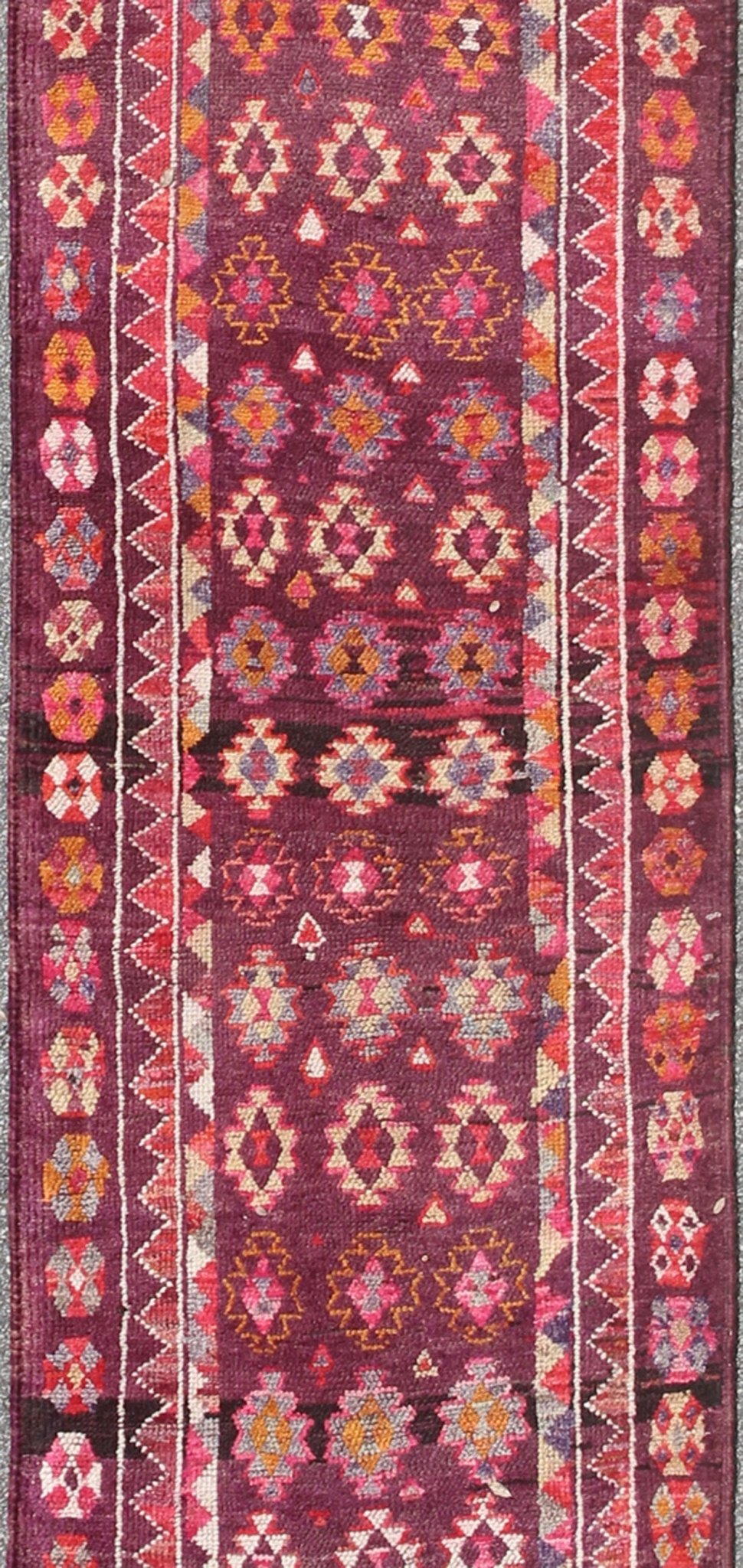 Colorful vintage Turkish Long Oushak runner with geometric design in Purple & Plum background , rug en - 165655, country of origin / type: Turkey / Oushak, circa 1950 This vintage Oushak runner (circa mid - 20th century) features a unique blend of c... - Keivan Woven ArtsEN - 165655 - 9056Rug