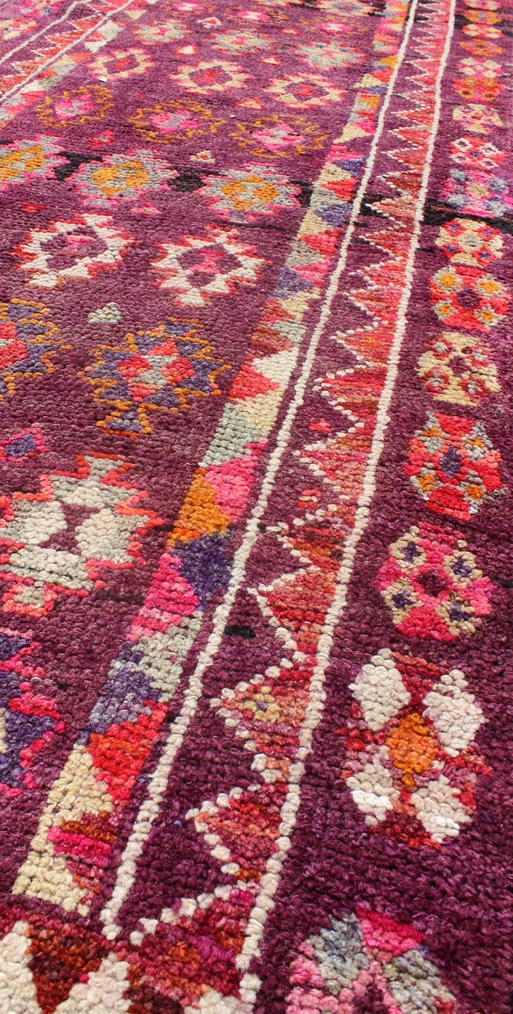 Colorful vintage Turkish Long Oushak runner with geometric design in Purple & Plum background , rug en - 165655, country of origin / type: Turkey / Oushak, circa 1950 This vintage Oushak runner (circa mid - 20th century) features a unique blend of c... - Keivan Woven ArtsEN - 165655 - 9056Rug