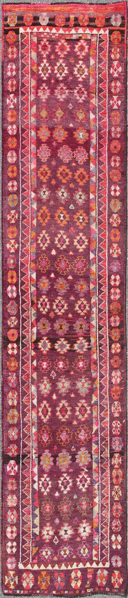 Colorful vintage Turkish Long Oushak runner with geometric design in Purple & Plum background , rug en - 165655, country of origin / type: Turkey / Oushak, circa 1950 This vintage Oushak runner (circa mid - 20th century) features a unique blend of c... - Keivan Woven ArtsEN - 165655 - 9056Rug