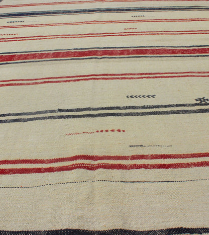Turkish Kilim rug with horizontal stripes in red and blue, cream background, rug en - 165684, country of origin / type: Turkey / Kilim, circa 1950 Woven during the mid - 20th century in Turkey, this designer Kilim is decorated with a horizontal stri... - Keivan Woven ArtsEN - 165684 - 9072Rug