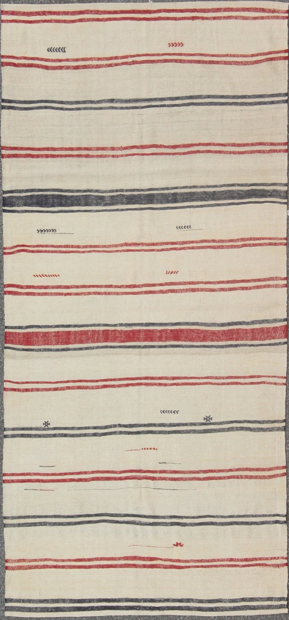 Turkish Kilim rug with horizontal stripes in red and blue, cream background, rug en - 165684, country of origin / type: Turkey / Kilim, circa 1950 Woven during the mid - 20th century in Turkey, this designer Kilim is decorated with a horizontal stri... - Keivan Woven ArtsEN - 165684 - 9072Rug