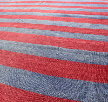 Vintage Striped Turkish Kilim with Casual Modern Design in Red and Blue Red and blue Vintage striped Turkish Kilim suited for modern casual interiors. Kilim rug with stripes, Keivan Woven Arts / rug/ EN - 165696, country of origin / type: turkey /... - Keivan Woven ArtsEN - 165696 - 9480Rug