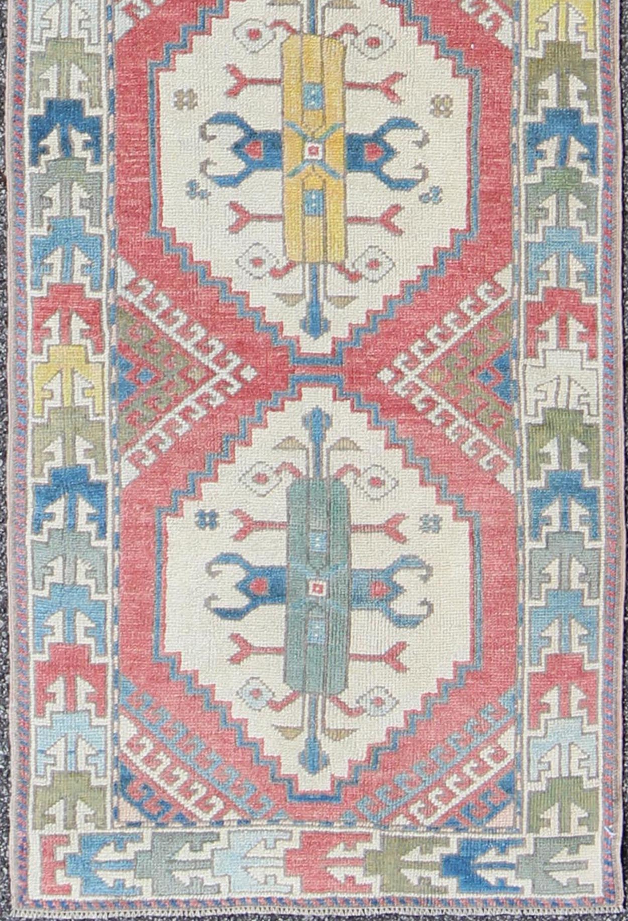 Colorful Vintage Oushak Turkish Narrow Runner with Geometric Design. Vintage Hand Knotted Oushak Turkish Runner With Geometric Design Vintage Oushak runner from Turkey with Medallion design in various blue and tan tones, Keivan Woven Arts... - Keivan Woven ArtsEN - 165744 - 9484Rug
