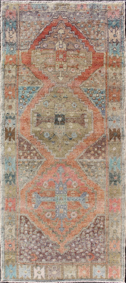 Antique Turkish Oushak Runner in Coral, Blue, Brown, Yellow Green & Rust Red Amazingly Beautiful antique Oushak runner with Geometric Medallion Design, rug EN - 165772 , country of origin / type: Turkey / Oushak, circa 1930 The painting li... - Keivan Woven ArtsEN - 165772 - 9496Rug