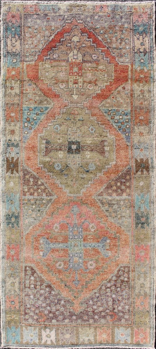 Antique Turkish Oushak Runner in Coral, Blue, Brown, Yellow Green & Rust Red Amazingly Beautiful antique Oushak runner with Geometric Medallion Design, rug EN - 165772 , country of origin / type: Turkey / Oushak, circa 1930 The painting li... - Keivan Woven ArtsEN - 165772 - 9496Rug