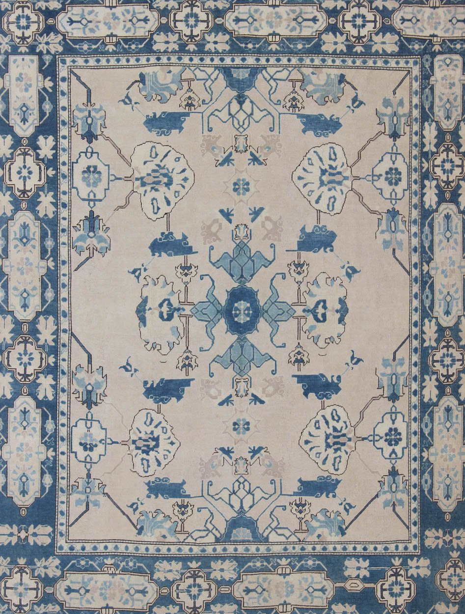 Oushak Rug from Mid - 20th Century Turkey with Blue and Cream Tribal Design Vintage Turkish Oushak in Cream and Blue, rug en - 165875, country of origin / type: Turkey / Oushak, circa 1940 This tribal design Oushak carpet features an array of... - Keivan Woven ArtsEN - 165875 - 11249Rug