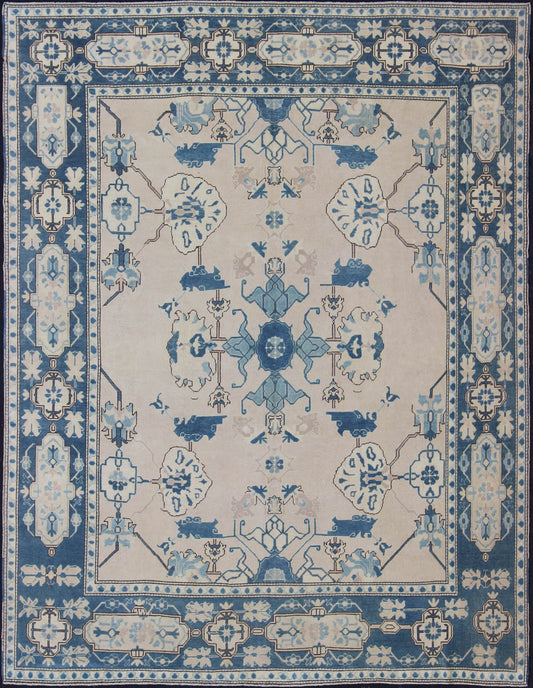 Oushak Rug from Mid - 20th Century Turkey with Blue and Cream Tribal Design Vintage Turkish Oushak in Cream and Blue, rug en - 165875, country of origin / type: Turkey / Oushak, circa 1940 This tribal design Oushak carpet features an array of... - Keivan Woven ArtsEN - 165875 - 11249Rug