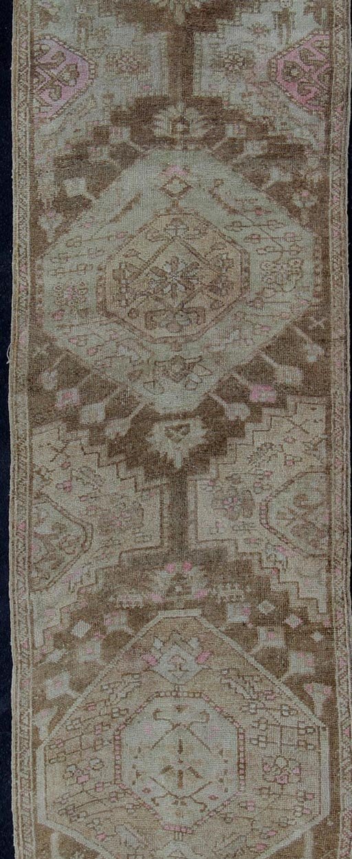 Vintage Oushak Runner from Turkey with vertical medallion design in brown, wheat, lavender pink, ivory, tones, rug en - 176011, country of origin / type: Turkey / Oushak, circa 1940 This beautiful vintage Oushak runner from 1940s Turkey features a... - Keivan Woven ArtsEN - 176011 - 11201Rug