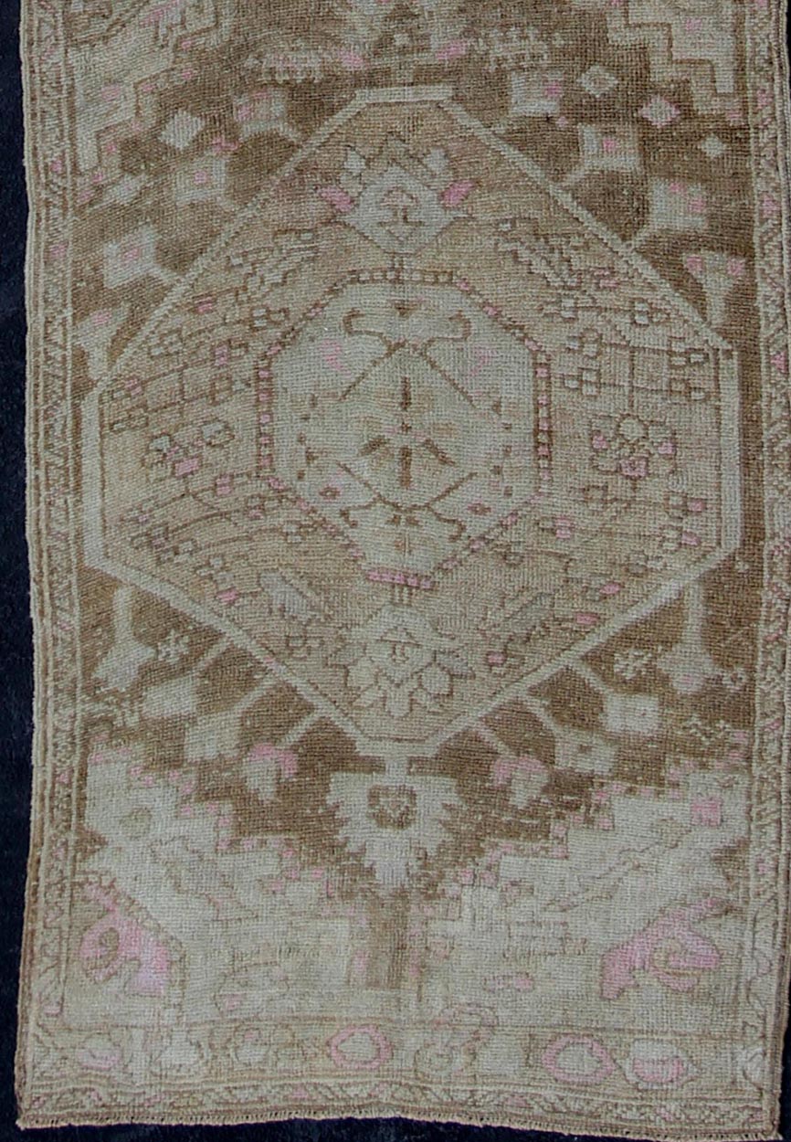 Vintage Oushak Runner from Turkey with vertical medallion design in brown, wheat, lavender pink, ivory, tones, rug en - 176011, country of origin / type: Turkey / Oushak, circa 1940 This beautiful vintage Oushak runner from 1940s Turkey features a... - Keivan Woven ArtsEN - 176011 - 11201Rug
