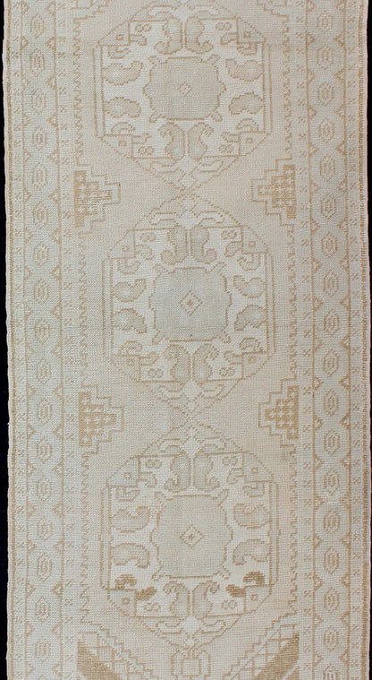 Subdued Vintage Turkish Oushak Runner with Medallions Lightly toned vintage Turkish Runner with Oushak design, Keivan Woven Arts / rug EN - 176032, country of origin / type: Turkey / Oushak, circa 1940. This vintage Turkish Oushak runner fe... - Keivan Woven ArtsEN - 176032 - 10233Rug