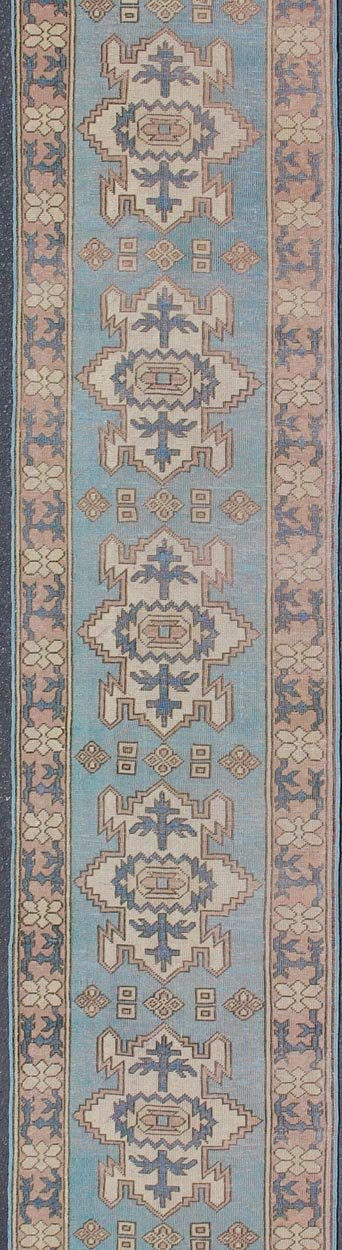 Long Vintage Turkish Runner with Geometric Design in Light Blue and Taupe kwarugs Long vintage Turkish runner with geometric design in light blue and taupe Vintage Oushak runner from Turkey with Medallion design in various color tones, rug e... - Keivan Woven ArtsEN - 176085 - 11437Rug