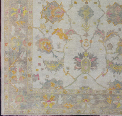 Turkish Oushak Reproduction Rug with Muted Color Palette and All - Over Flower Design Turkish Oushak rug with array of light and medium tone colors and design, Keivan Woven Arts / rug EN - 176126, country of origin / type: Turkey / Oushak Thi... - Keivan Woven ArtsEN - 176126 - 12613Rug
