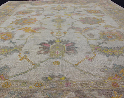 Turkish Oushak Reproduction Rug with Muted Color Palette and All - Over Flower Design Turkish Oushak rug with array of light and medium tone colors and design, Keivan Woven Arts / rug EN - 176126, country of origin / type: Turkey / Oushak Thi... - Keivan Woven ArtsEN - 176126 - 12613Rug