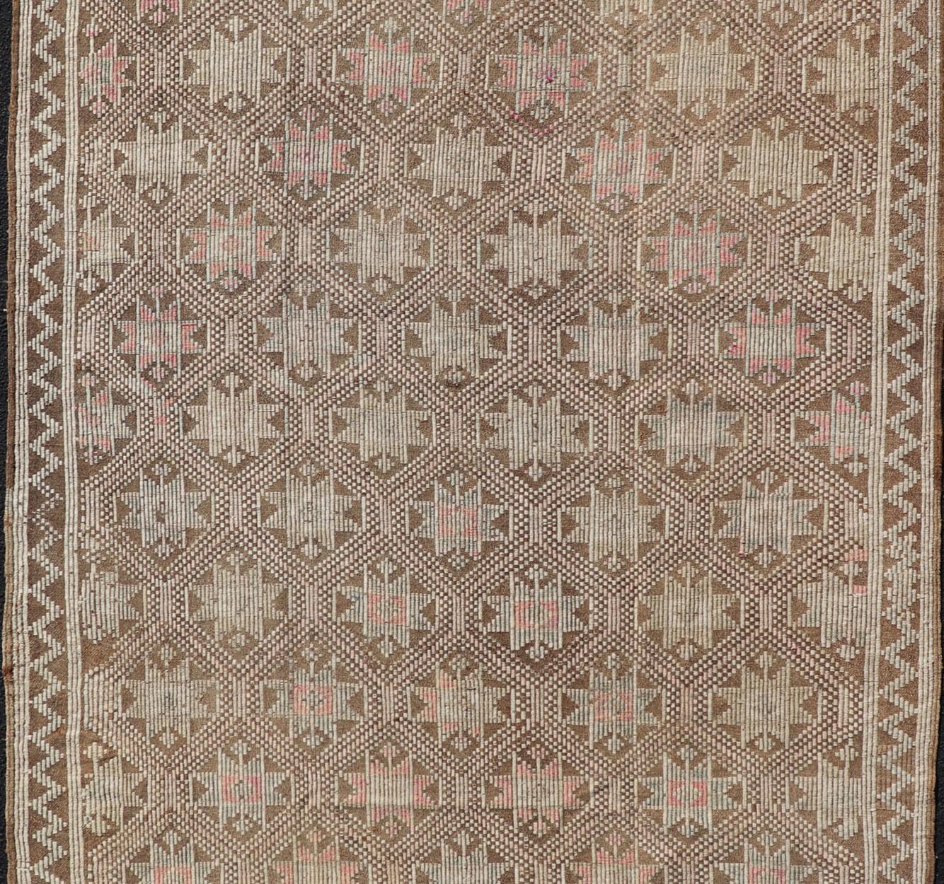 Measures: 5'2 x 9'3 Vintage Turkish Embroidered Kilim with All - Over Star Design on A Taupe Ground. Keivan Woven Arts / rug EN - 176232, country of origin / type: Turkey / Kilim, circa 1950 This vintage Kilim displays an array of designs, including... - Keivan Woven ArtsEN - 176232 - 21907Rug