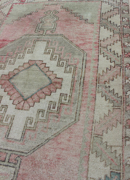 Elegant Oushak Rug From Turkey with Tribal Medallion Design in Light Colors Pink, light green, and ivory vintage rug with flower medallion pattern, Keivan Woven Arts / rug/EN - 176255, country of origin / type: Turkey / Oushak, circa 1940 This ... - Keivan Woven ArtsEN - 176255 - 10253Rug