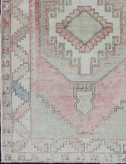 Elegant Oushak Rug From Turkey with Tribal Medallion Design in Light Colors Pink, light green, and ivory vintage rug with flower medallion pattern, Keivan Woven Arts / rug/EN - 176255, country of origin / type: Turkey / Oushak, circa 1940 This ... - Keivan Woven ArtsEN - 176255 - 10253Rug