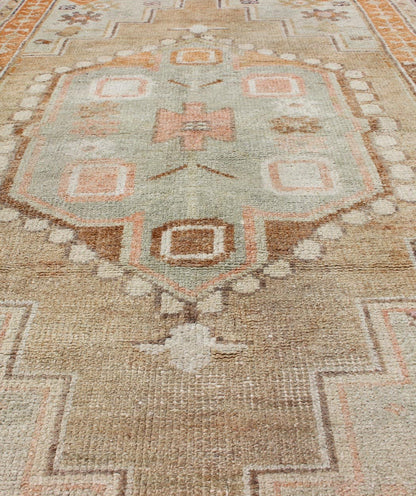 Medallion Antique Oushak Rug from Turkey Beautiful Turkish Rug with Cheerful Design, rug en - 176299, country of origin / type: Turkey / Oushak, circa 1930 This antique Turkish Oushak rug features a central medallion design flanked by vario... - Keivan Woven ArtsEN - 176299 - 11277Rug