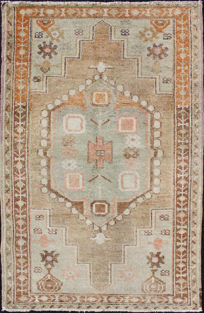 Medallion Antique Oushak Rug from Turkey Beautiful Turkish Rug with Cheerful Design, rug en - 176299, country of origin / type: Turkey / Oushak, circa 1930 This antique Turkish Oushak rug features a central medallion design flanked by vario... - Keivan Woven ArtsEN - 176299 - 11277Rug