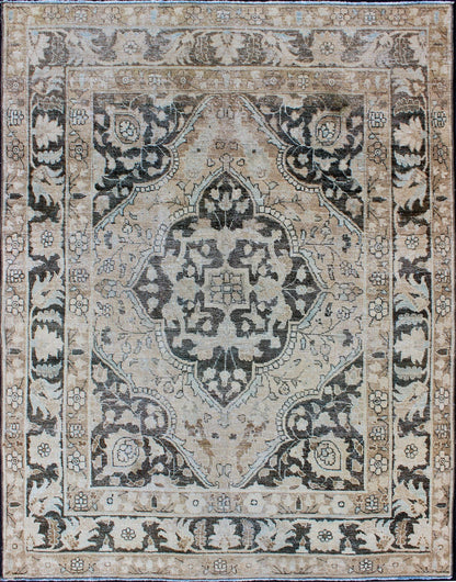 Antique Persian Haj - Jalili Tabriz Rug with Geometric Medallion Design in D. Charcoal, Light Honey, Light blue & Taupe This wonderful antique Persian Tabriz with geometrics and flora in dark gray medallion, cornices and border Keivan Woven Arts ... - Keivan Woven ArtsEN - 176489 - 10177Rug