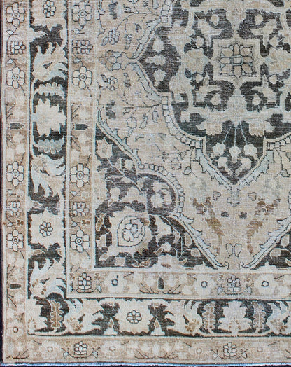 Antique Persian Haj - Jalili Tabriz Rug with Geometric Medallion Design in D. Charcoal, Light Honey, Light blue & Taupe This wonderful antique Persian Tabriz with geometrics and flora in dark gray medallion, cornices and border Keivan Woven Arts ... - Keivan Woven ArtsEN - 176489 - 10177Rug
