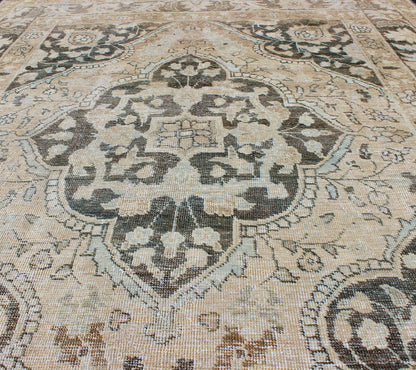 Antique Persian Haj - Jalili Tabriz Rug with Geometric Medallion Design in D. Charcoal, Light Honey, Light blue & Taupe This wonderful antique Persian Tabriz with geometrics and flora in dark gray medallion, cornices and border Keivan Woven Arts ... - Keivan Woven ArtsEN - 176489 - 10177Rug